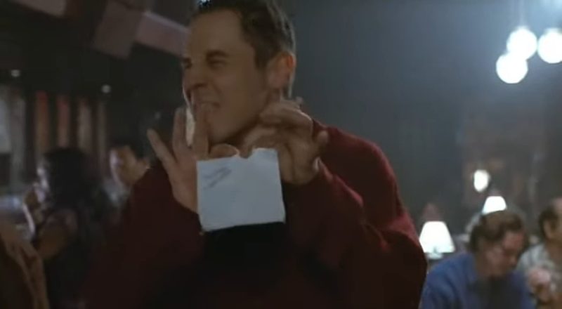 Swingers: the guy in the red shirt grinning and holding up a napkin with her number on it